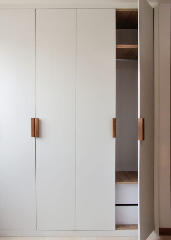 Wardrobe with wooden handles